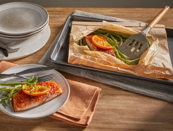 smoked salmon sitting in a open parchment cooking bag